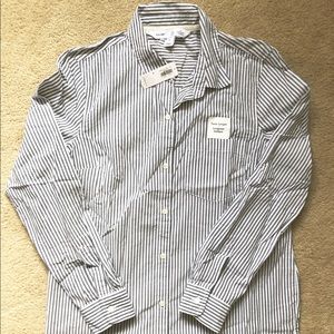 Tunic length dress shirt.